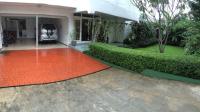 TC-KM101 - Front_garage_and_garden.JPG